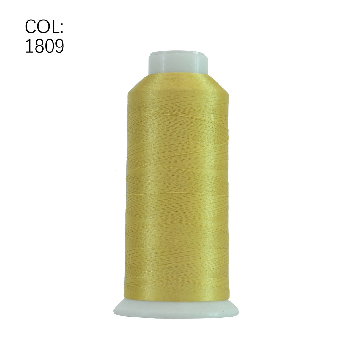 A spool of gold embroidery thread with a white core, labeled COL: 1809.
