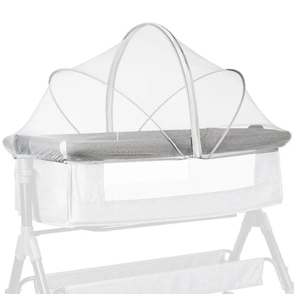 A portable bassinet with a clear mosquito net cover for baby sleep.