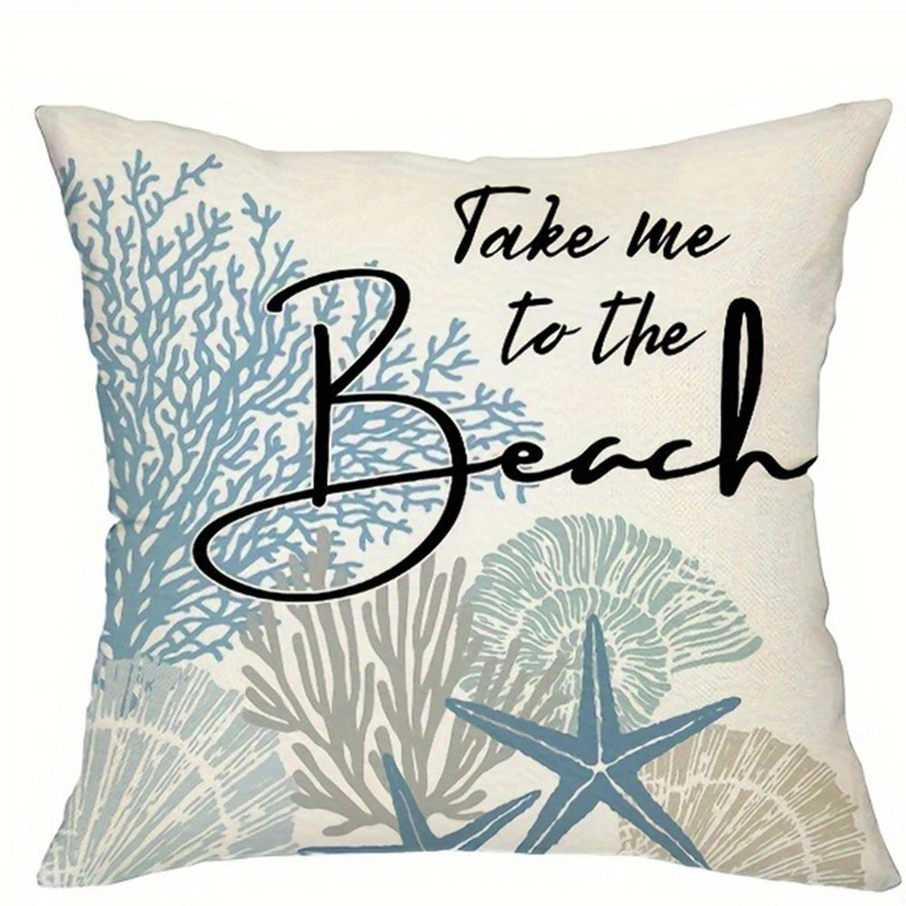 A beige decorative pillow cover featuring a black script text that reads Take me to the Beach over a background of blue and g