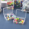 Clear plastic boxes filled with colorful nickel-plated dressmaking pins and various colored heads.