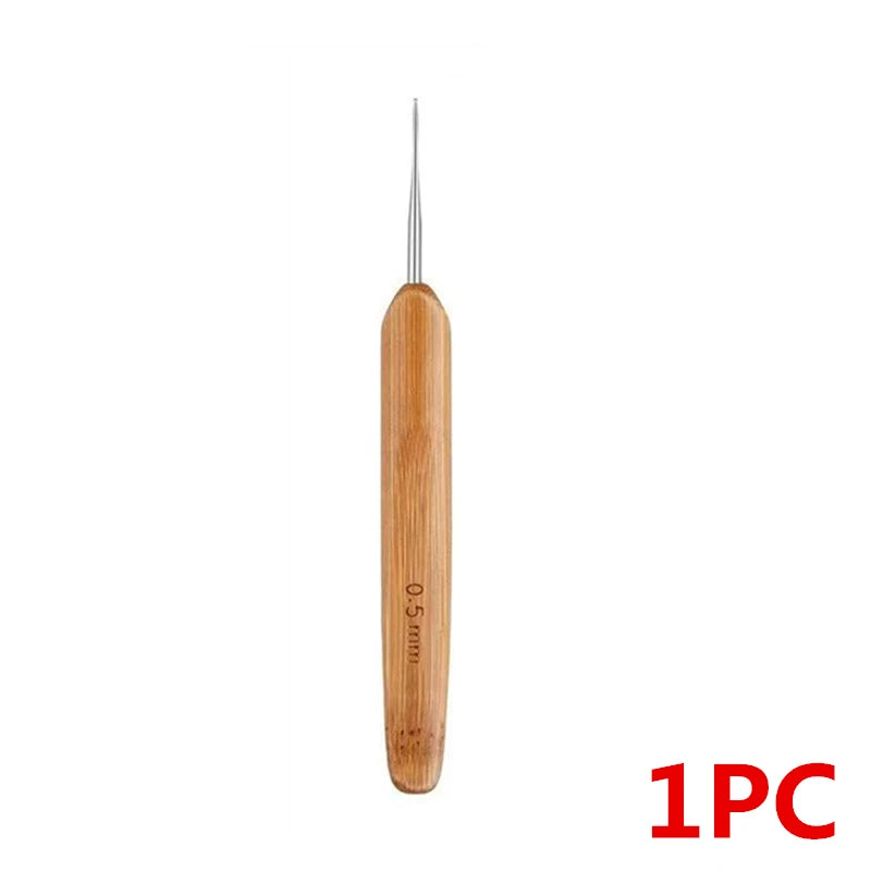 A single wooden precision crochet hook used for hair dreadlocks.