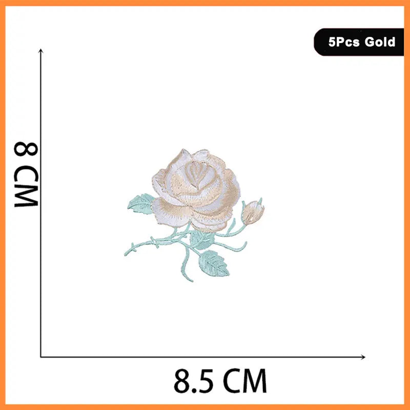 Five gold embroidered rose patches shown against a measurement scale.