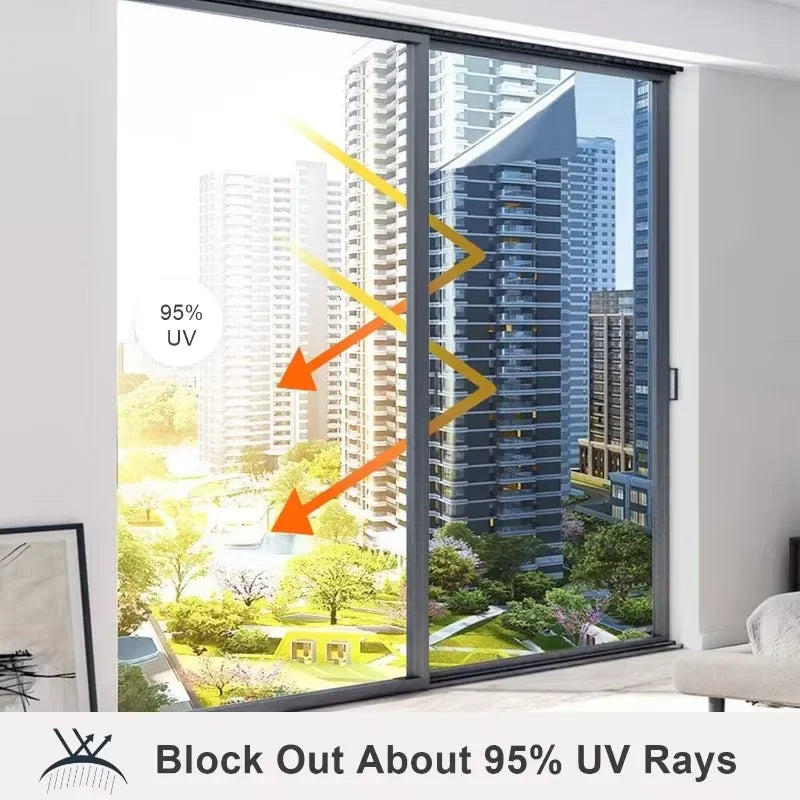 A modern glass door showing a city skyline view with a reflection, demonstrating the ability to block about 95% of UV rays.