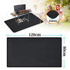 Black heavy-duty double-sided grill mat used for outdoor cooking and grilling.