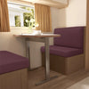 Purple stretch RV dinette seat covers installed in a modern interior setting.