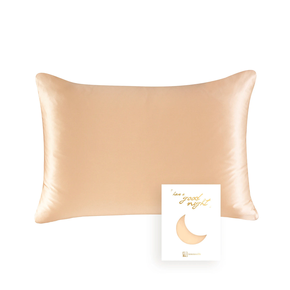 A rectangular, satin-finish pillow in a nude beige color.