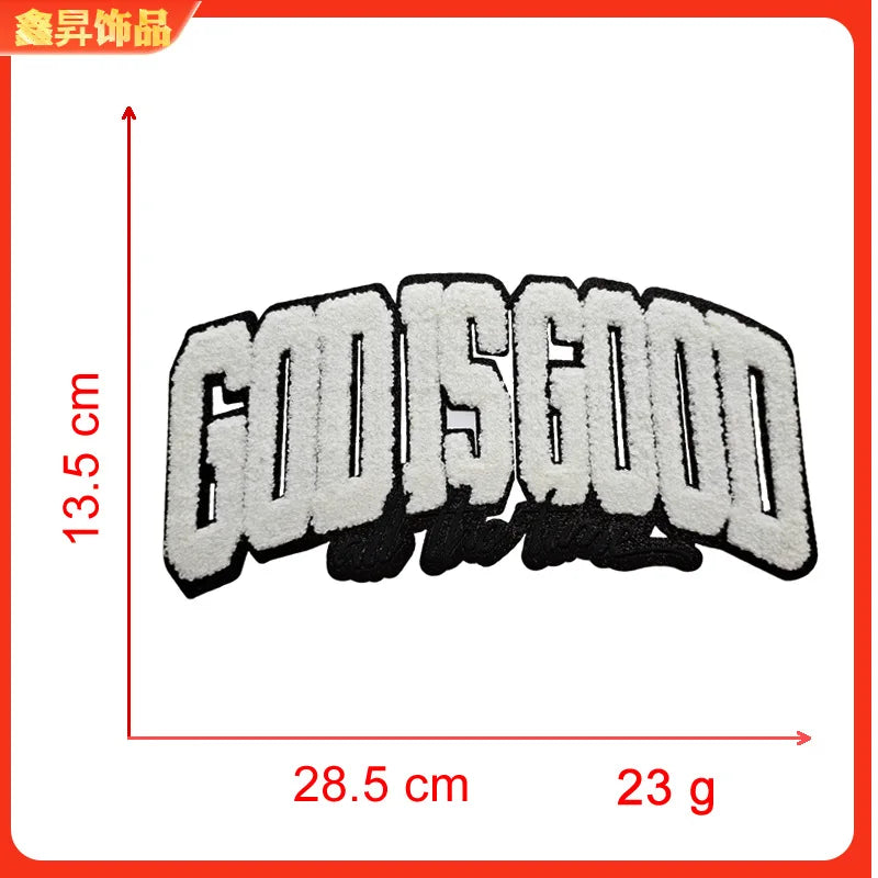 A black iron-on embroidery patch with the text GODISGOOD, measuring 13.5 cm high and 28.5 cm wide, weighing 23 g.