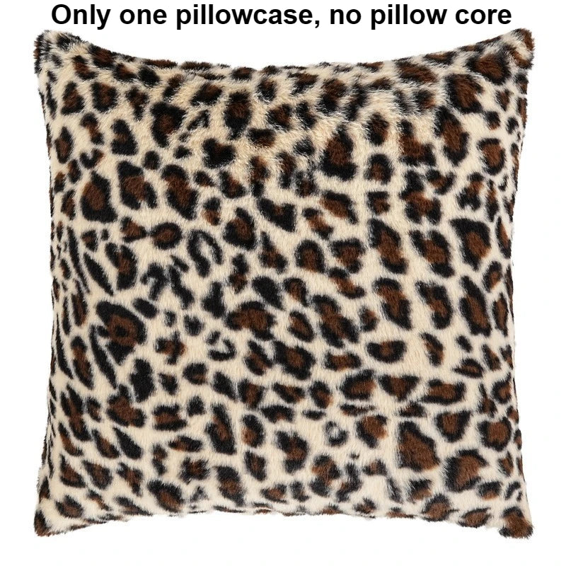 A square pillowcase with a leopard print fabric featuring brown and black spots.