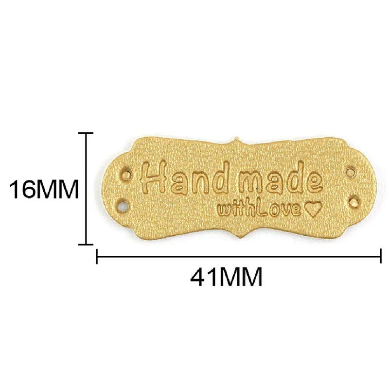 Gold-colored PU leather embossed tag with the text Handmade with Love