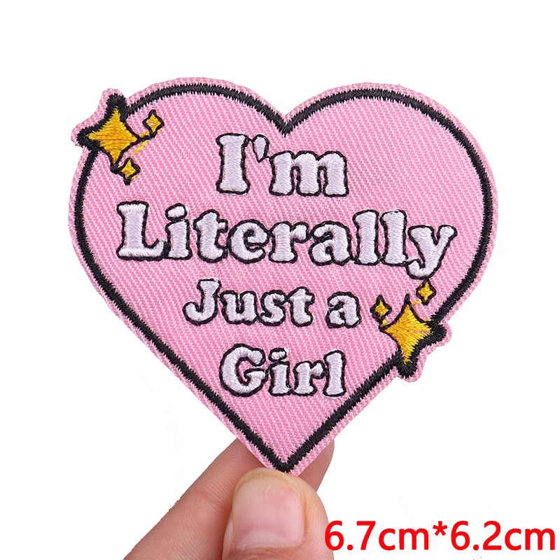 Pink heart shaped embroidered patch with text I'm Literally Just a Girl