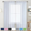 Modern sheer white curtain with rod pocket covering a window in a living room or bedroom.
