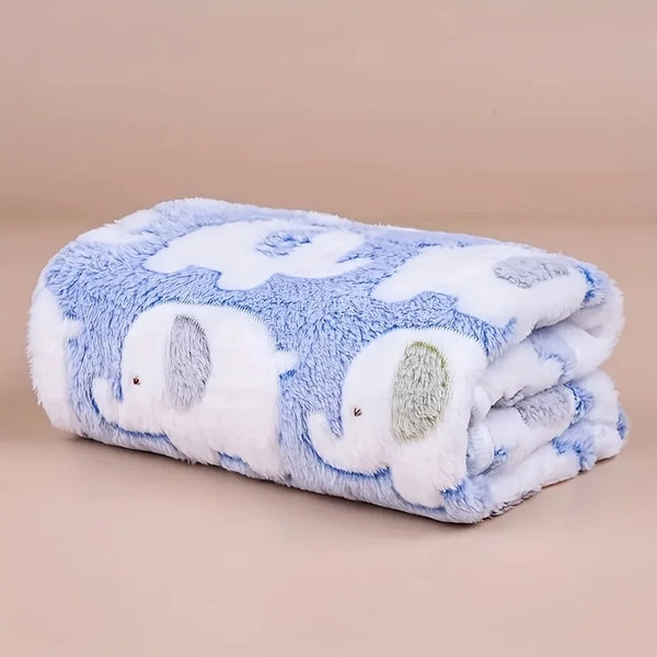 A soft blue and white flannel blanket featuring a pattern of elephants for pets.