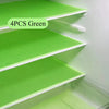 Four green silicone fridge and drawer liners displayed inside a white compartment.