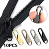 A set of ten detachable metal zipper puller repair kits shown next to a black zipper tape.