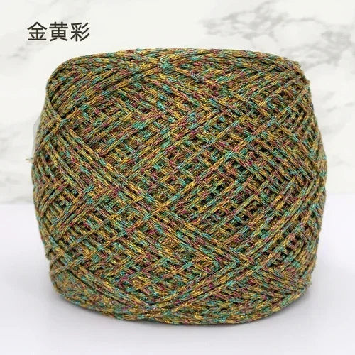 A ball of metallic silk crocheting and knitting yarn with a multicolored, textured appearance.