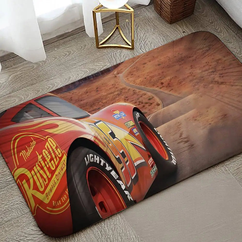 A cartoon anti-slip door mat featuring a rusted car design placed on a light gray floor.