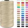 Spool of beige ice silk crochet yarn with various colored spools next to it.
