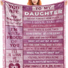 A pink printable knit blanket featuring inspirational text about a daughter and love