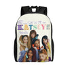 A canvas backpack featuring a colorful design with various faces and text.