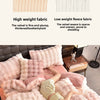 A pink plush rabbit hair bedding set featuring soft velvet textures and fluffy fabric.