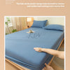 A close-up of a blue fitted sheet being pulled and released to demonstrate the elastic design.