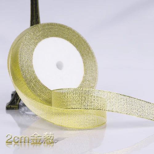Roll of light yellow glitter organza ribbon for gift wrapping and DIY crafts