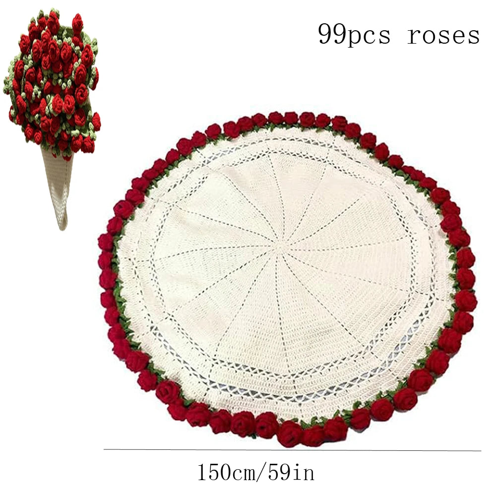 A round white knitted throw blanket with a red floral border and a decorative rose bouquet shown next to it.