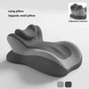 A gray ergonomic memory foam wedge pillow shown with an adjustable headrest feature.