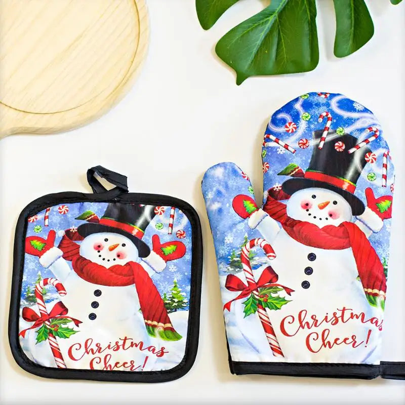 Festive Christmas insulated oven mitts featuring a snowman and Santa design on blue fabric