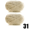 A ball of thick, beige velvet yarn used for knitting and crochet projects.