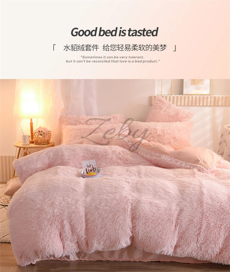 A pink plush mink velvet duvet set is displayed on a bed with white curtains and wooden furniture.