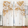 A pair of white curtains featuring a gold floral pendant print design.