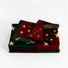 A three-piece patchwork bedding set featuring dark red and green fabric with gold star and crescent moon embroidery.
