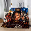 A dark blue and black retro printed flannel throw blanket featuring a portrait of Michael Jackson.