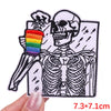Embroidered skull iron-on patch featuring a skeleton design and a rainbow color accent