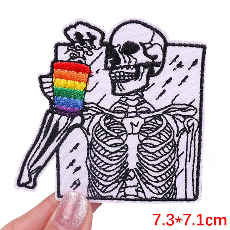 Embroidered skull iron-on patch featuring a skeleton design and a rainbow color accent