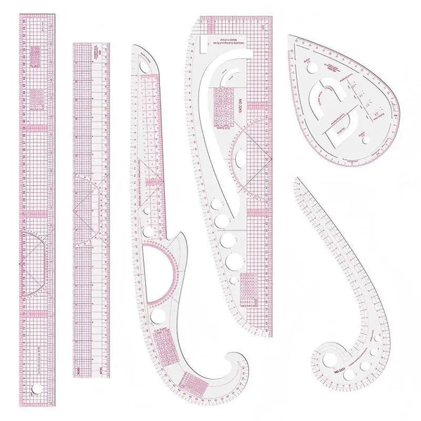 A set of precision sewing rulers and French curve templates for sewing projects.