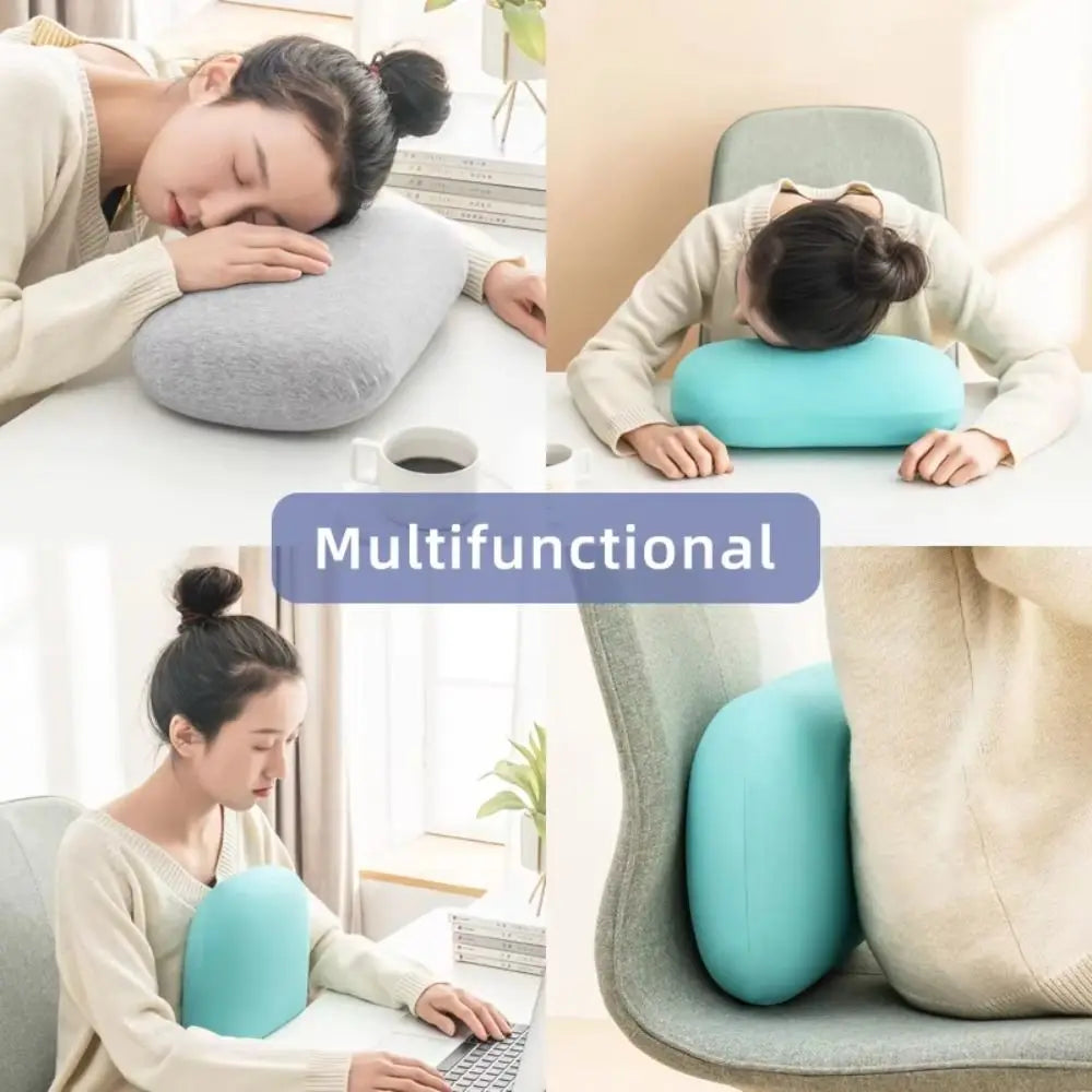 A woman is shown using a light blue memory foam neck and travel pillow for support while working on a laptop.