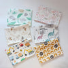 A collection of soft cotton baby pillow covers featuring various nature and animal patterns.