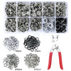 A collection of various metal snap fasteners and rings in clear plastic packaging.