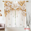 A pair of sheer white curtains decorated with gold floral prints and long pearl drop accents.