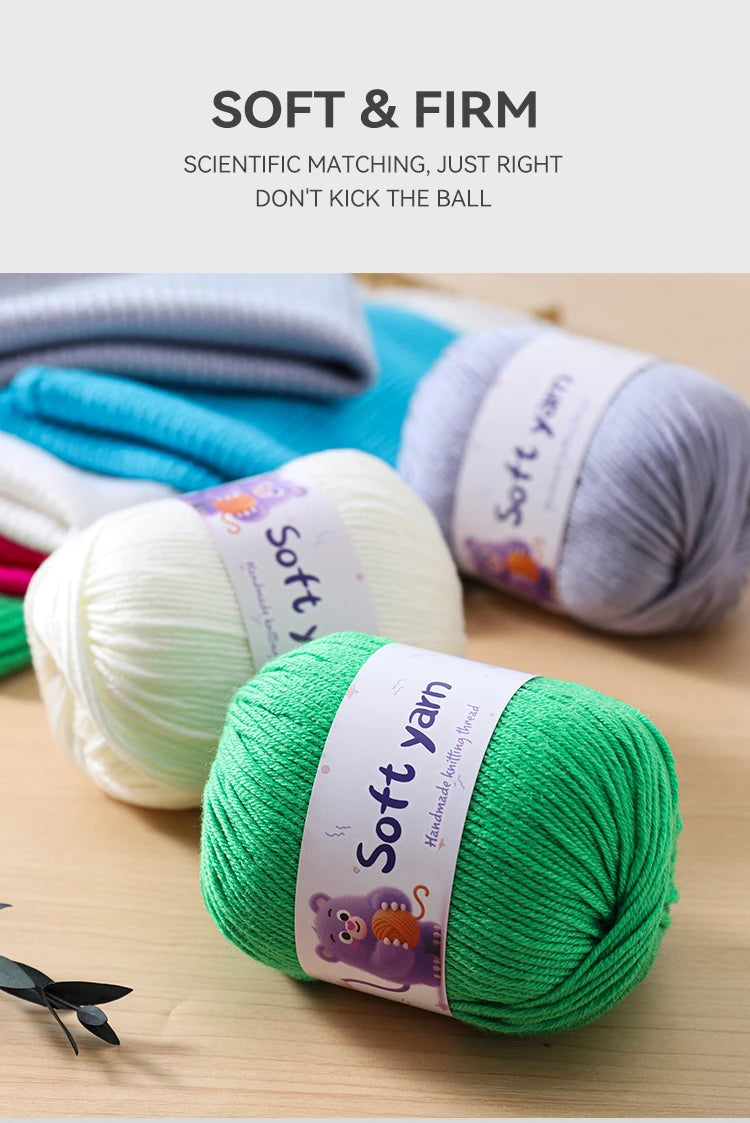 A collection of soft and firm colored acrylic yarn skeins, including light blue, white, purple, and bright green, laid out on