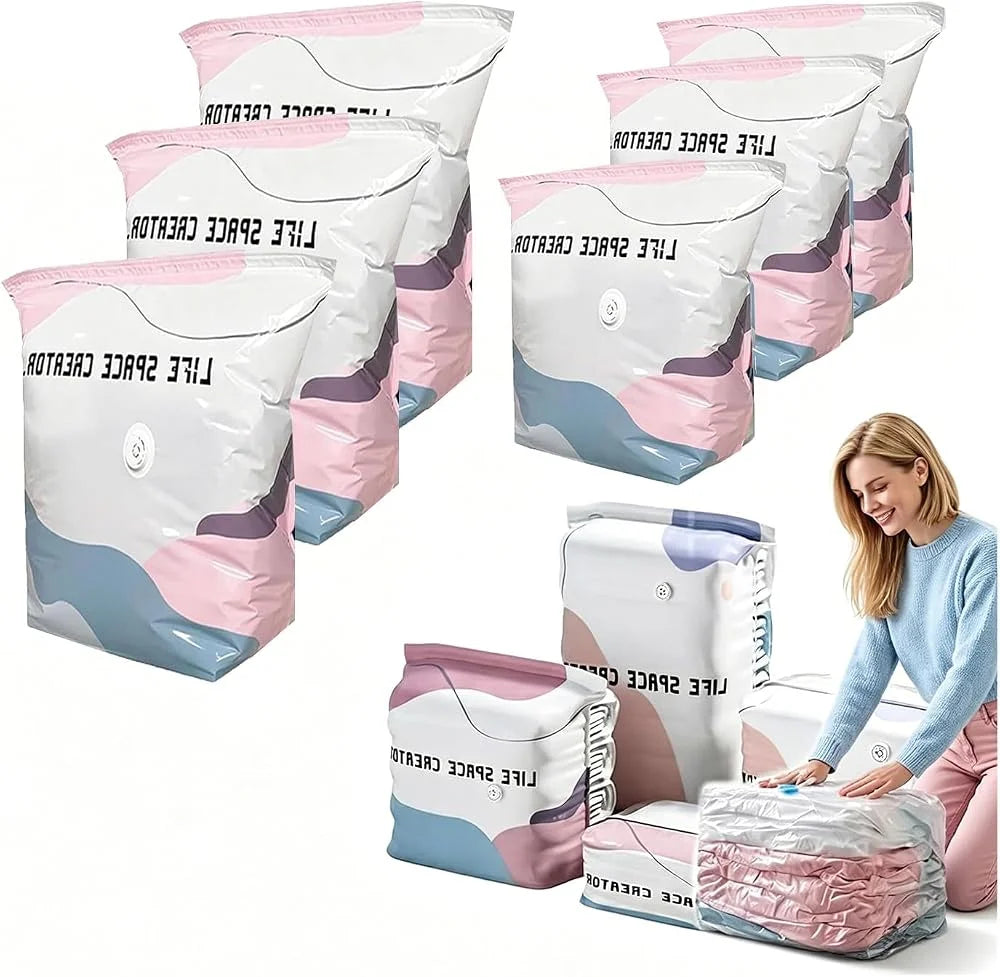 Multiple pink and white space-saving vacuum storage bags are displayed, some filled with fabric.