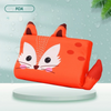 An orange fox-shaped memory foam neck pillow for toddlers resting on a white surface.