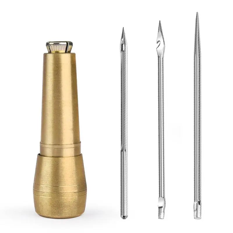 A gold-colored leather sewing awl and stitching kit with a protective cap.