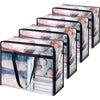 A set of clear and black storage bags with zippers stacked in a row.