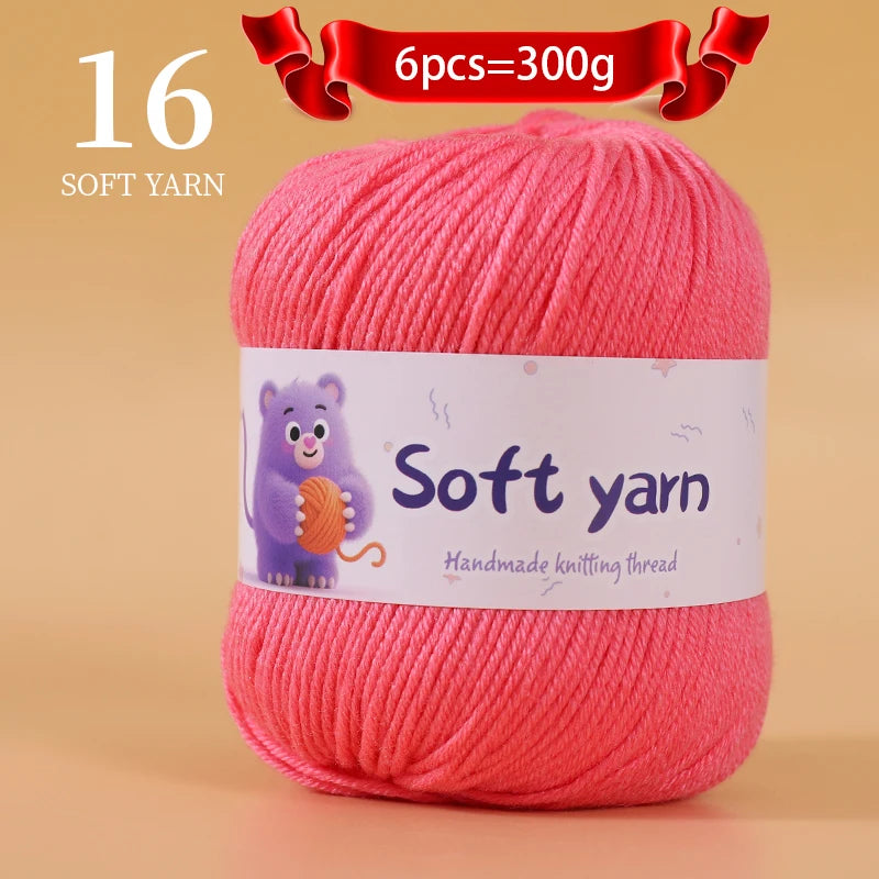 A skein of pink soft yarn labeled as 16 soft yarn with a weight of 300g for handmade knitting thread.