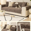 A brown textured sofa cushion cover displayed on a beige sofa with white accents and a white rug.