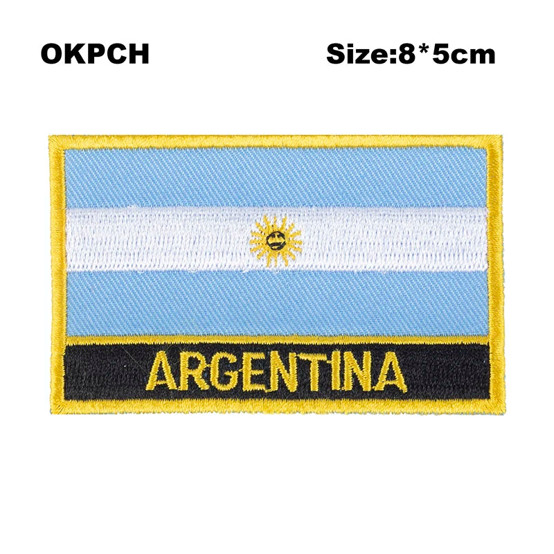 Embroidered patch of the flag of Argentina featuring horizontal blue and white stripes and a golden sun emblem.