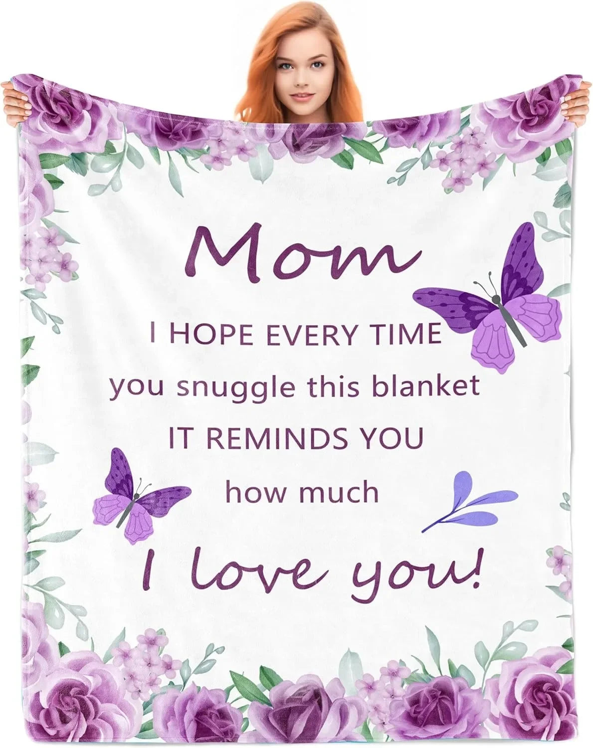 A purple floral blanket featuring a butterfly design with the text I hope every time you snuggle this blanket it reminds you 